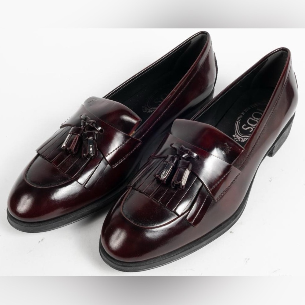 Tod's fringed tassel loafers in a burgundy or merlot leather finish